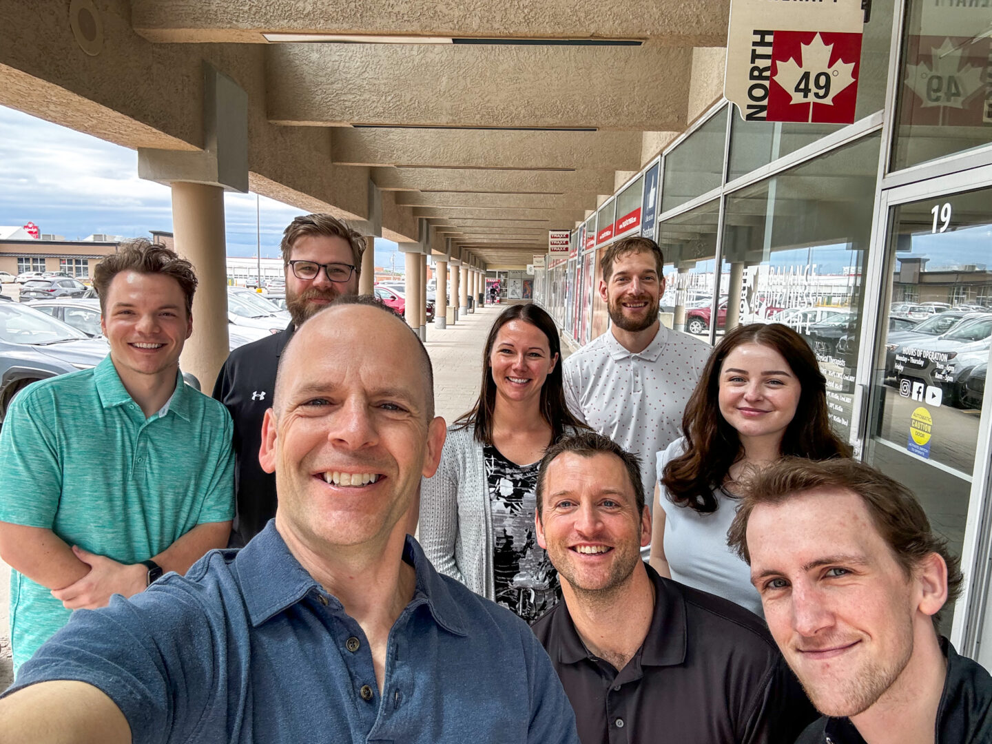 North 49 Physical Therapy team members smiling for a selfie photo.